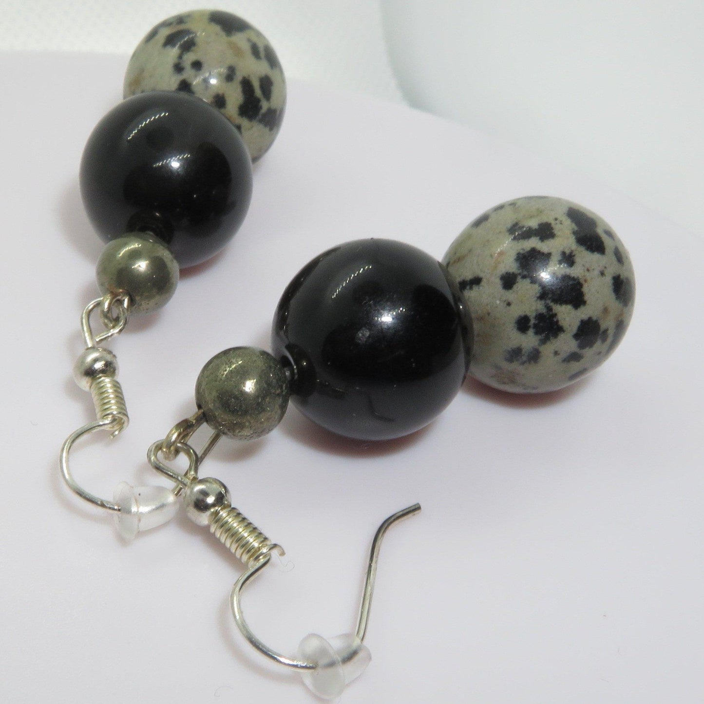 Earrings of Obsidian, pyrite and dalmation stone