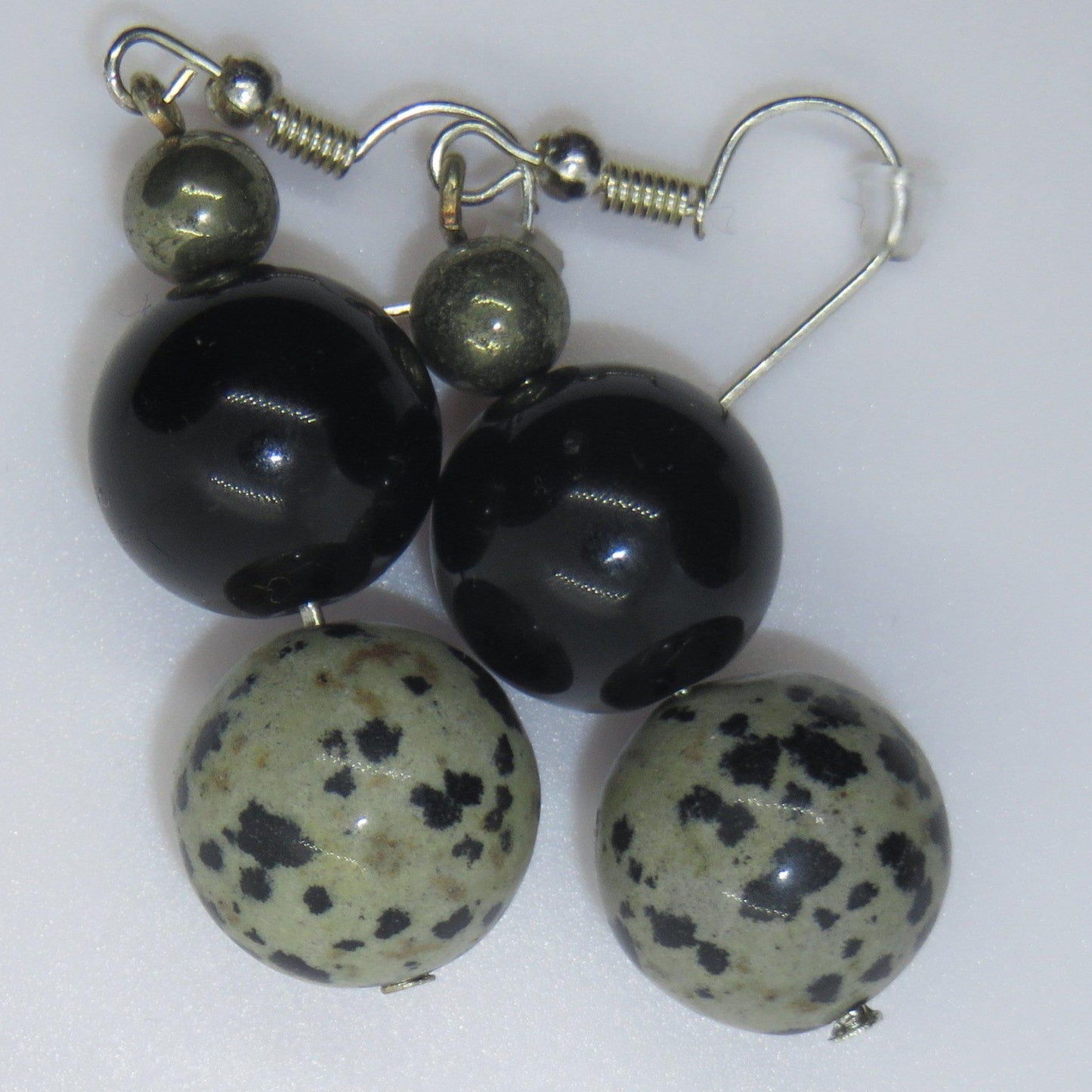 beautiful earrings of gold obsidian, dalmation stone and pyrite. 
